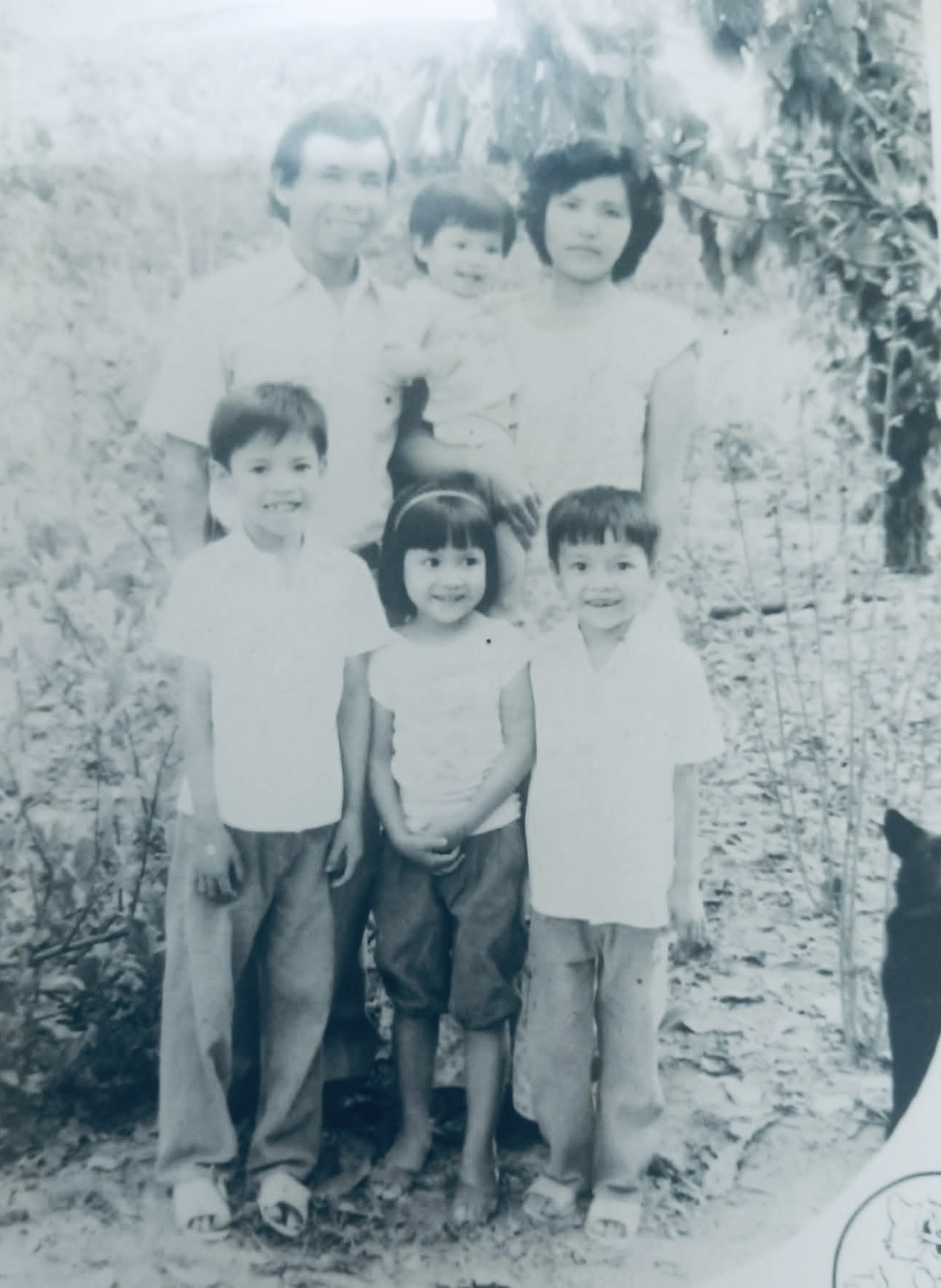 A childhood photograph with family
