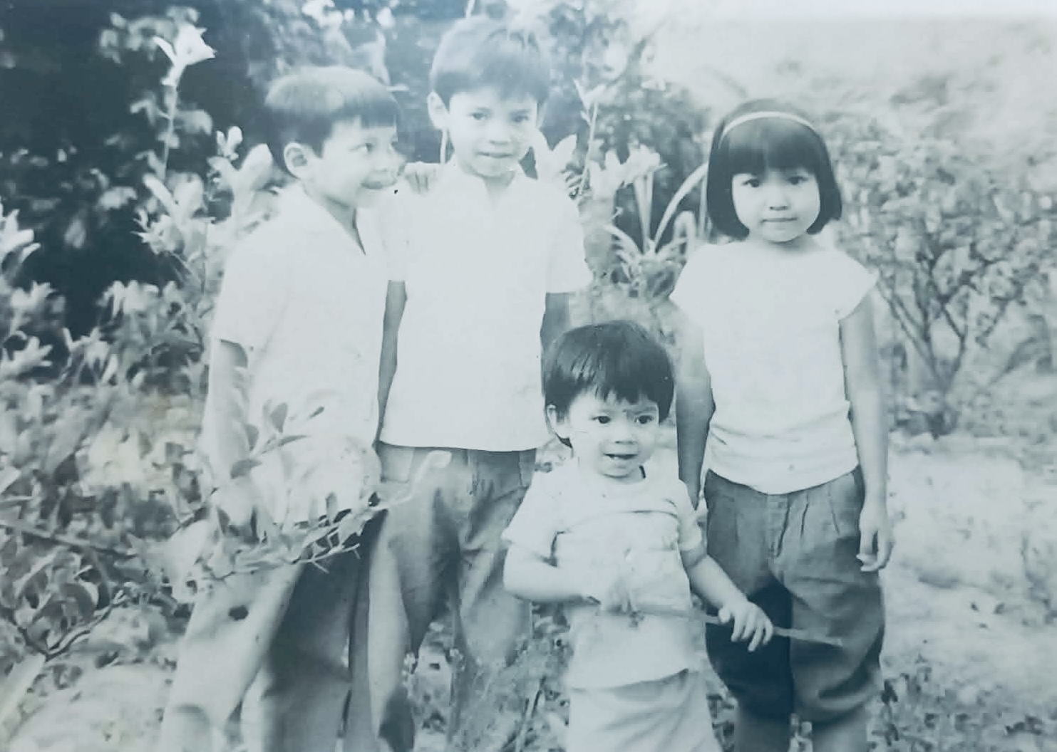 A childhood photograph of the artist with her siblings
